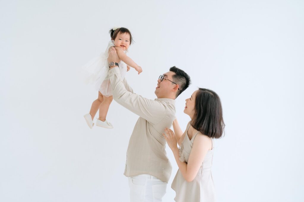 Happy family with parents and children sharing a joyful moment together, symbolizing love, connection, and modern parenting in 2025.